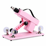 Pink A2 thrusting sex machine with adjustable frame, textured base and suction cup mounts on a white background